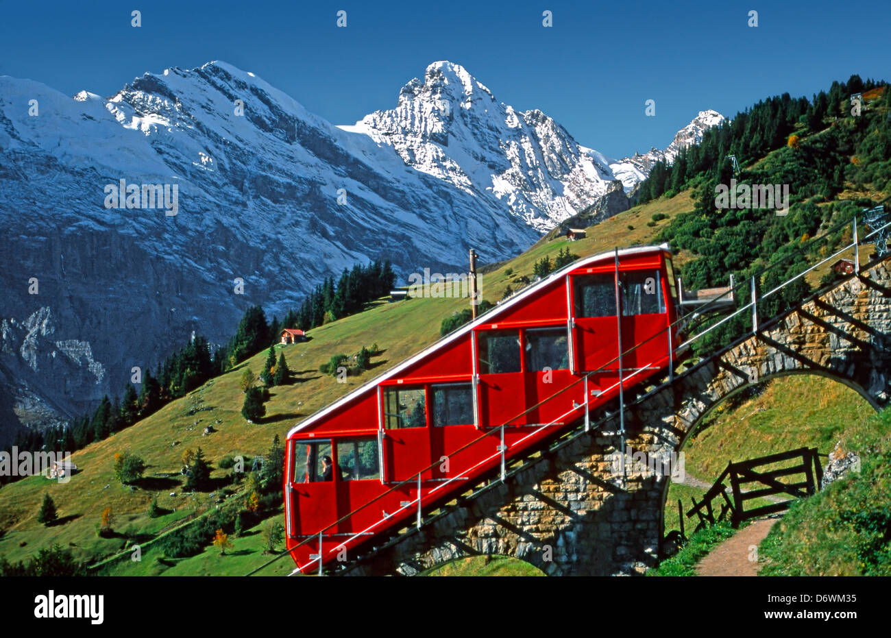 Tram on slanted tracks with the Gspaltenhorn in background, Allmendhubelbahn above Murren, Switzerland Stock Photo