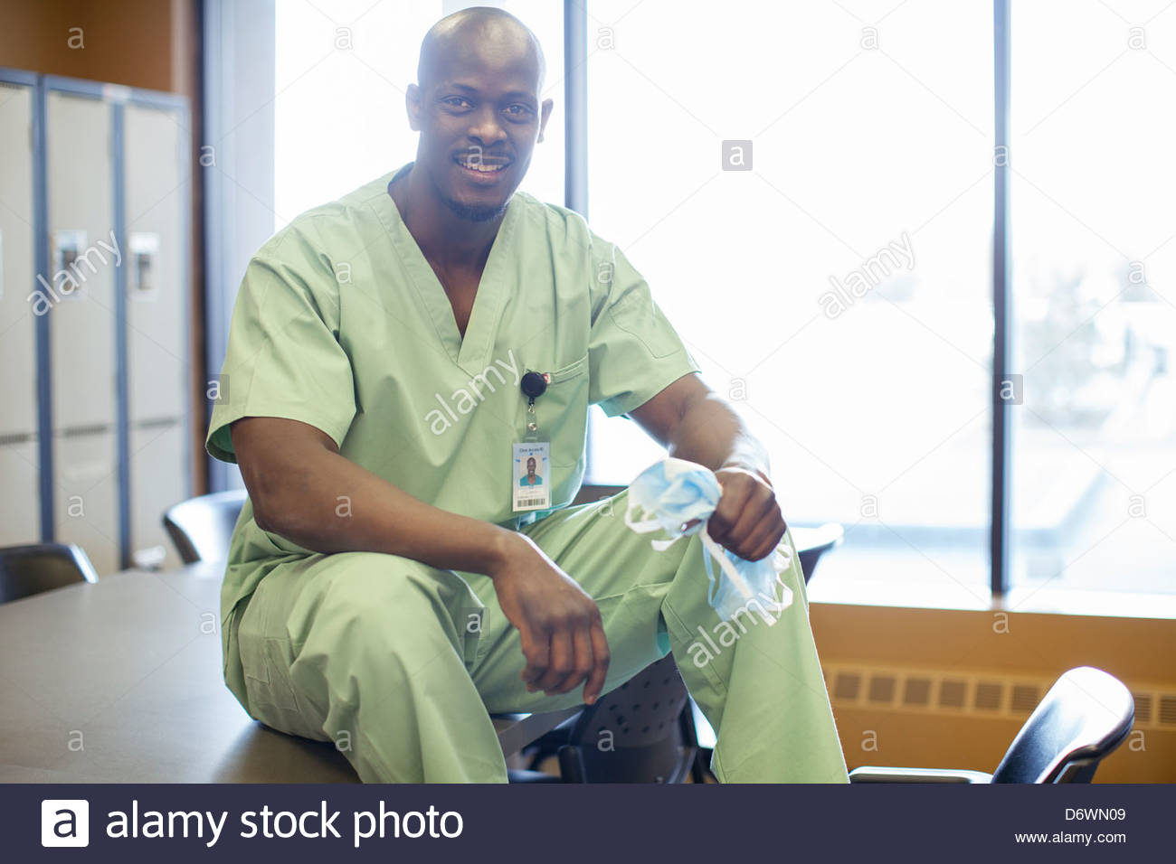 Portrait of confident male surgeon in meeting room Stock Photo