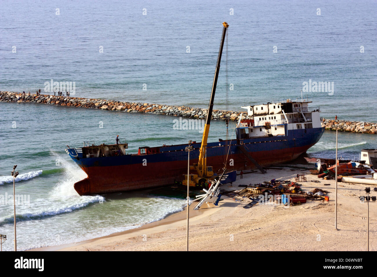 Ship breaking on the Beach, Coastal Freighter run aground in Ajman, United Arab Emirates Stock Photo