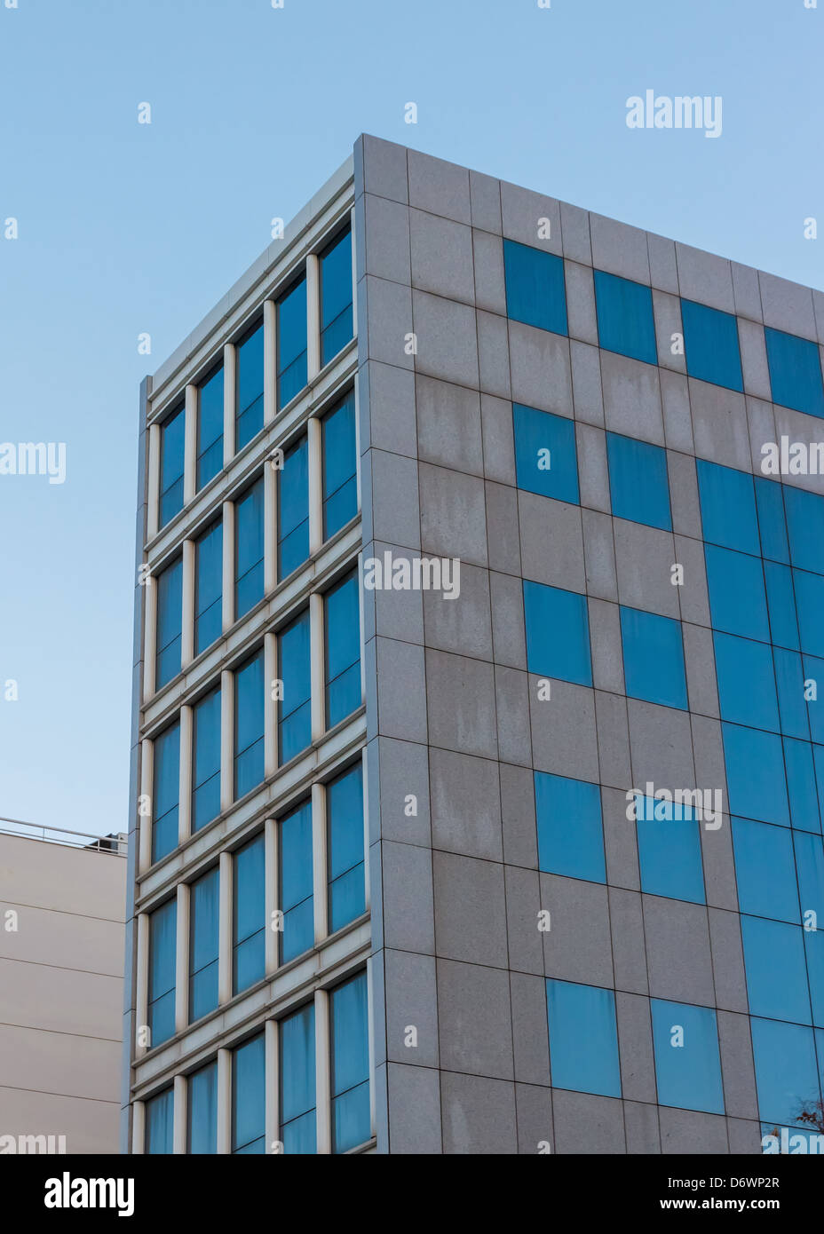 Abstract modern building detail background with sky color reflection Stock Photo