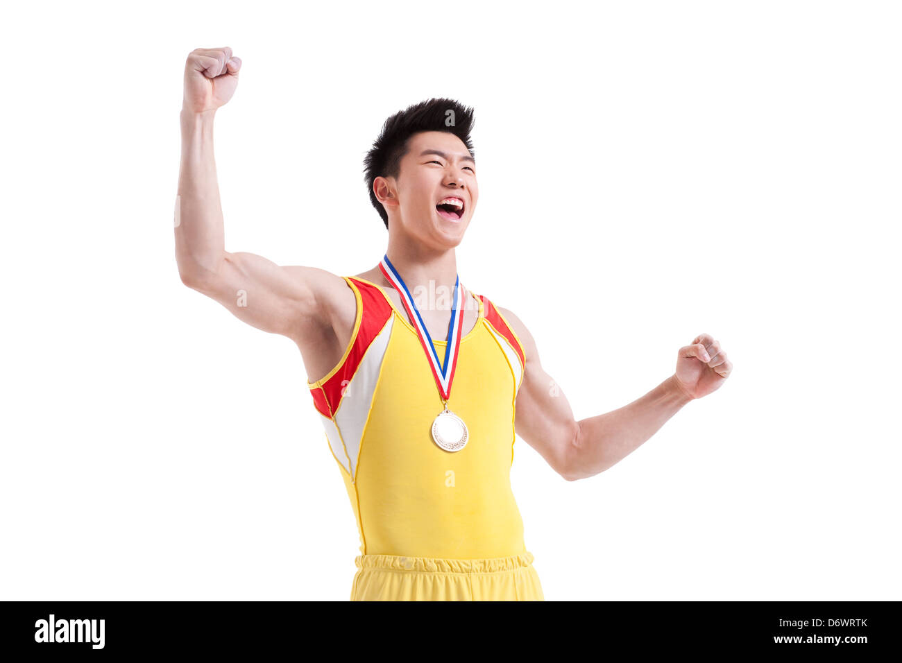 Athlete punching the air for winning Stock Photo Alamy