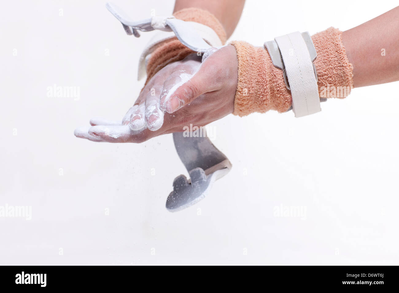 Gymnastic athlete with talcum powder Stock Photo - Alamy