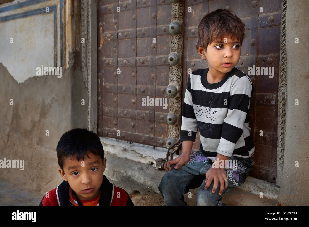 Portrait of young india boy with black line around the eyes (to protect from the evil eye), Mandawa, India Stock Photo