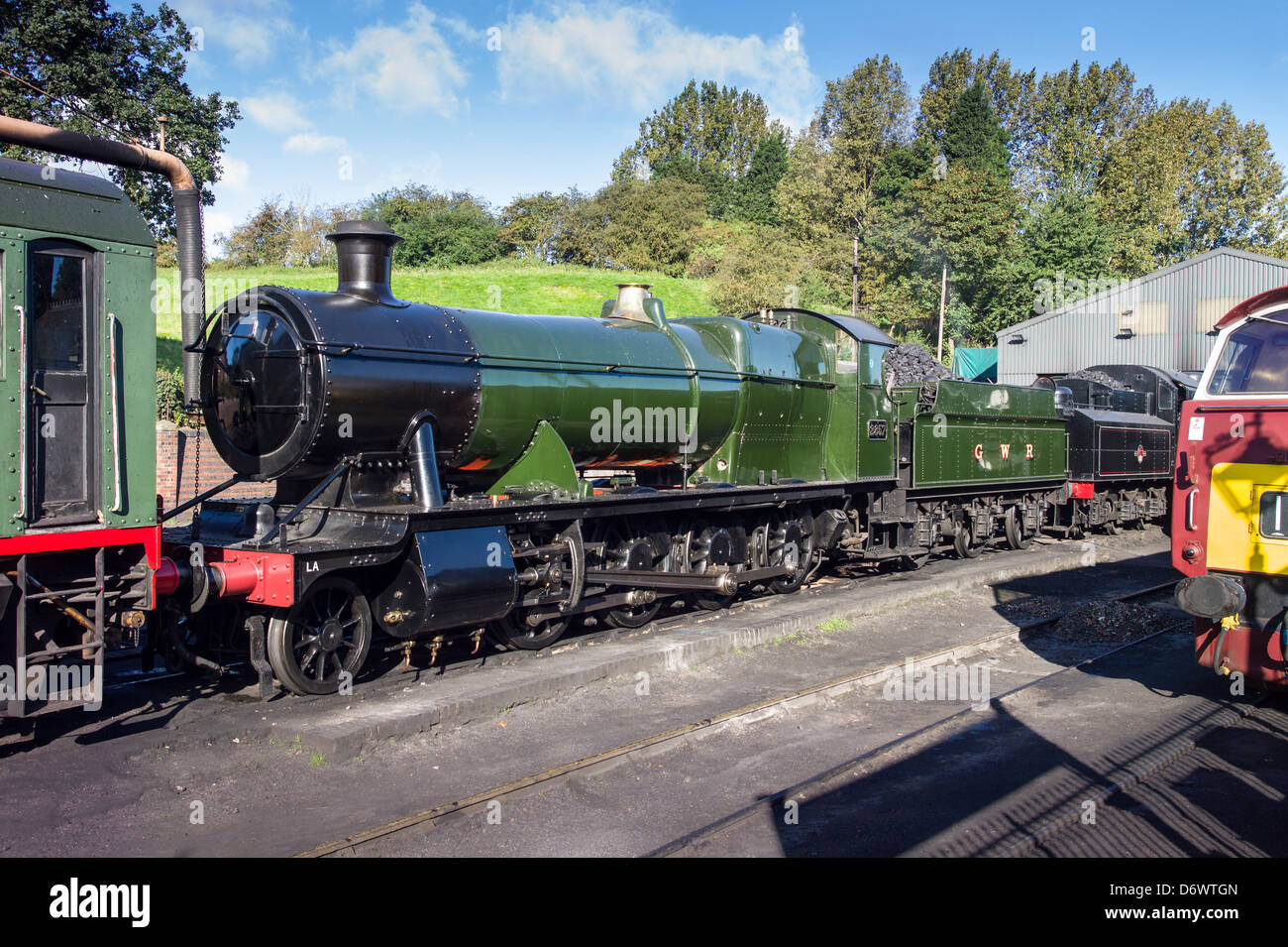 Old (1918) ex-GWR steam railway engine No. 2857 outside the engine shed at Bridgnorth station UK Stock Photo