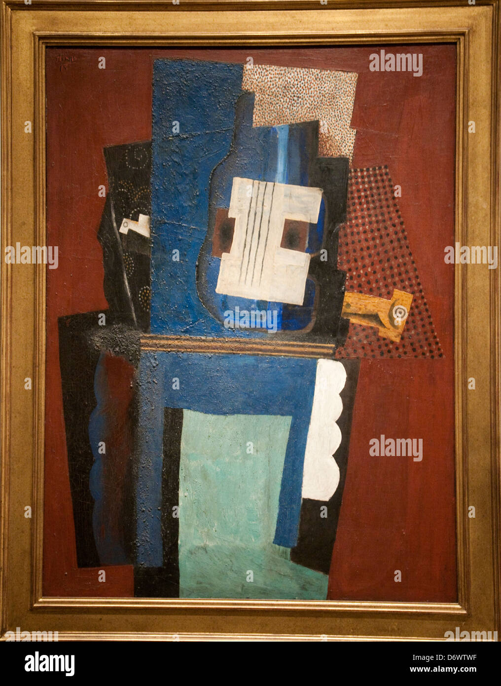 Guitar and on a Mantelpiece (1915) by Pablo Picasso in the