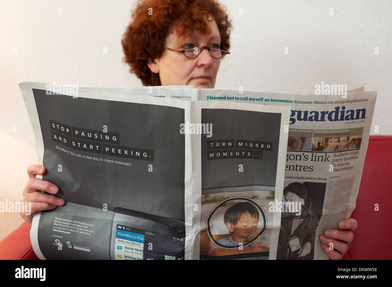 The Guardian newspaper Blackberry wrap around advert Stock Photo