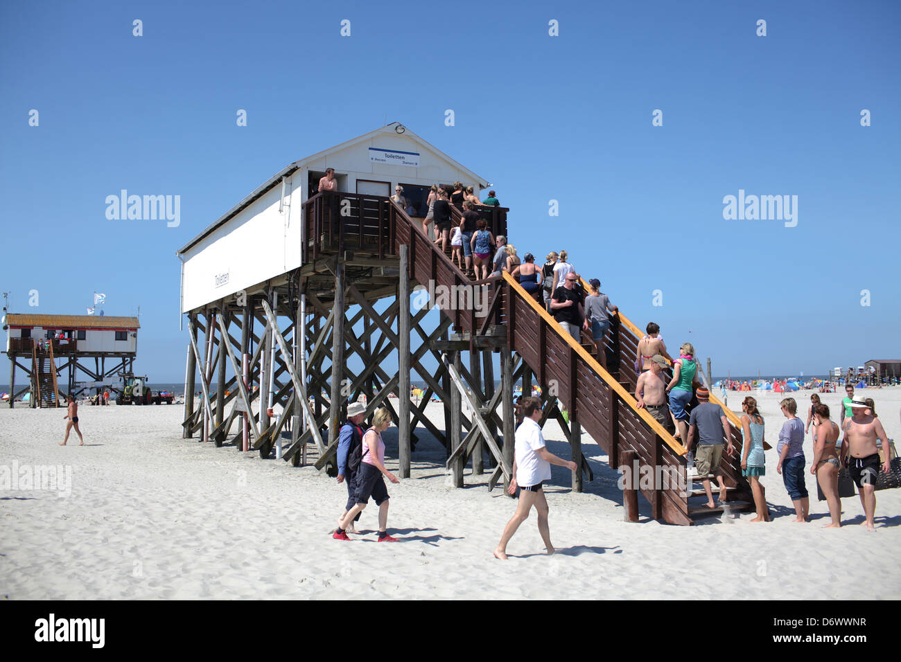 Sankt Peter-Ording, Germany, long queues at the toilets at the beach Stock Photo