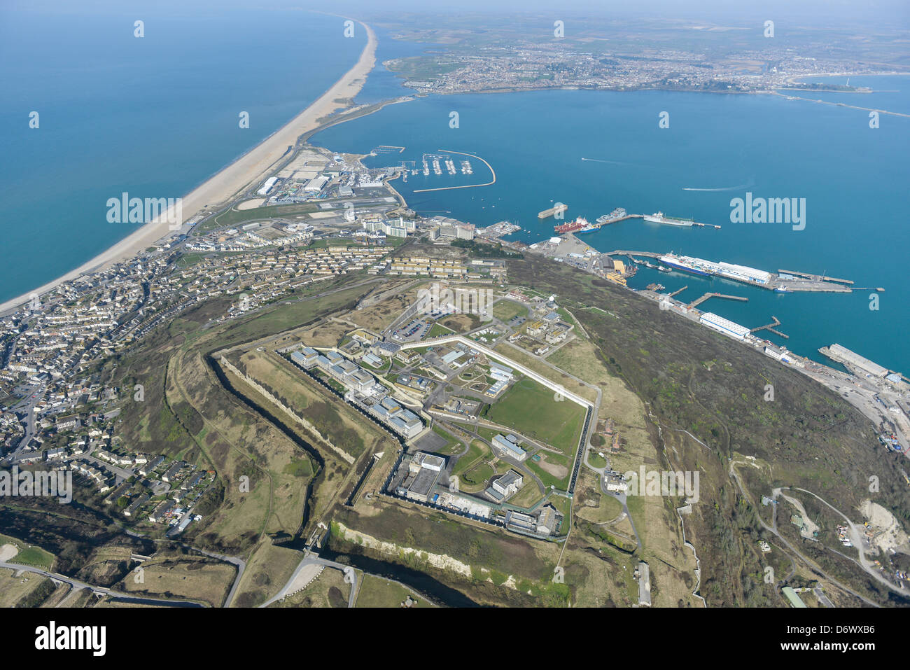 Aerial photograph of the Isle of Portland with Chesil Beach and Weymouth in the background. Stock Photo