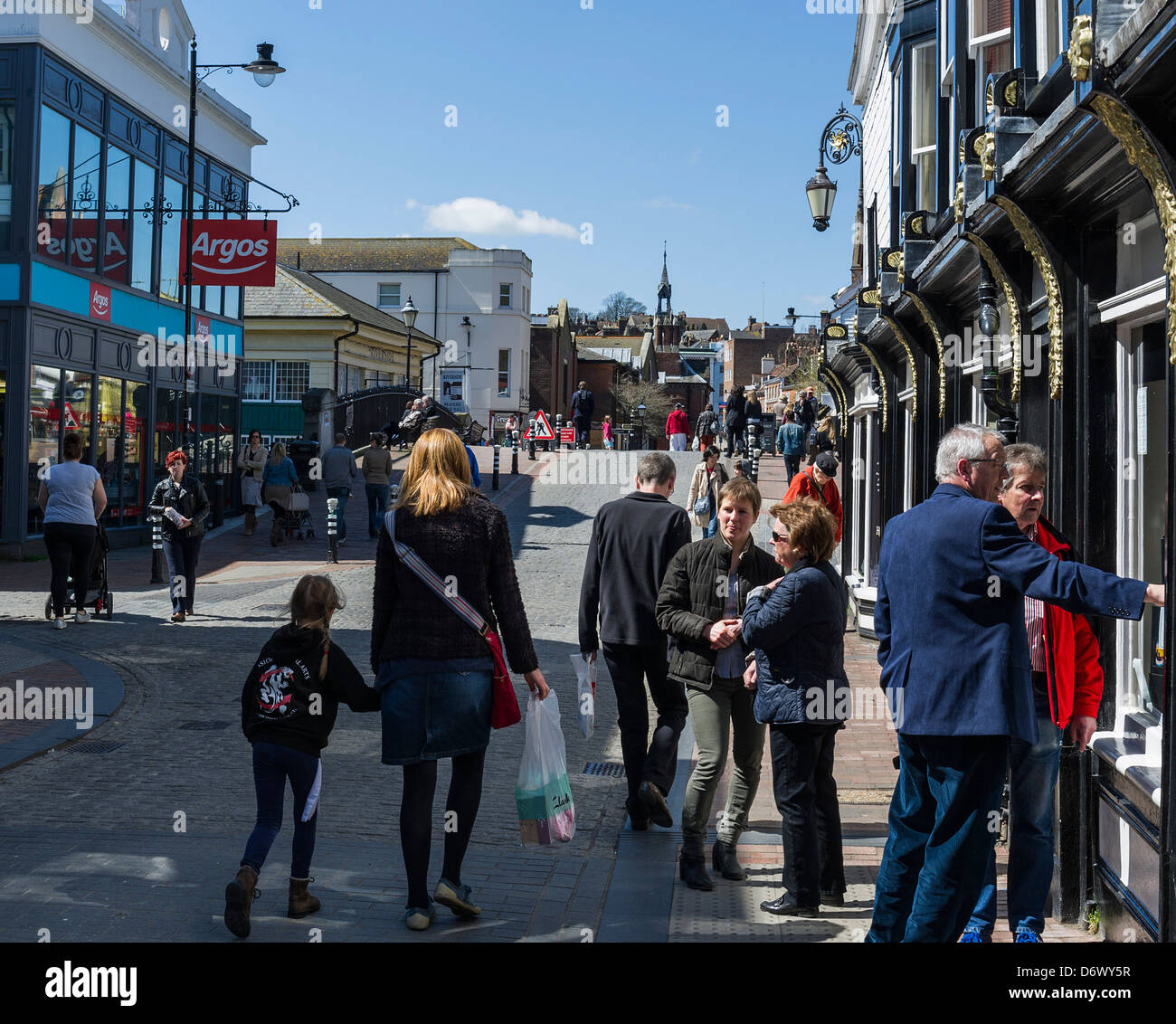 Shoppers in Cliffe High Street in Lewes. Stock Photo