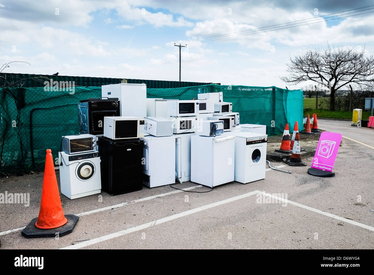 White goods discarded recycling dumped rubbish garbage disposal stacked