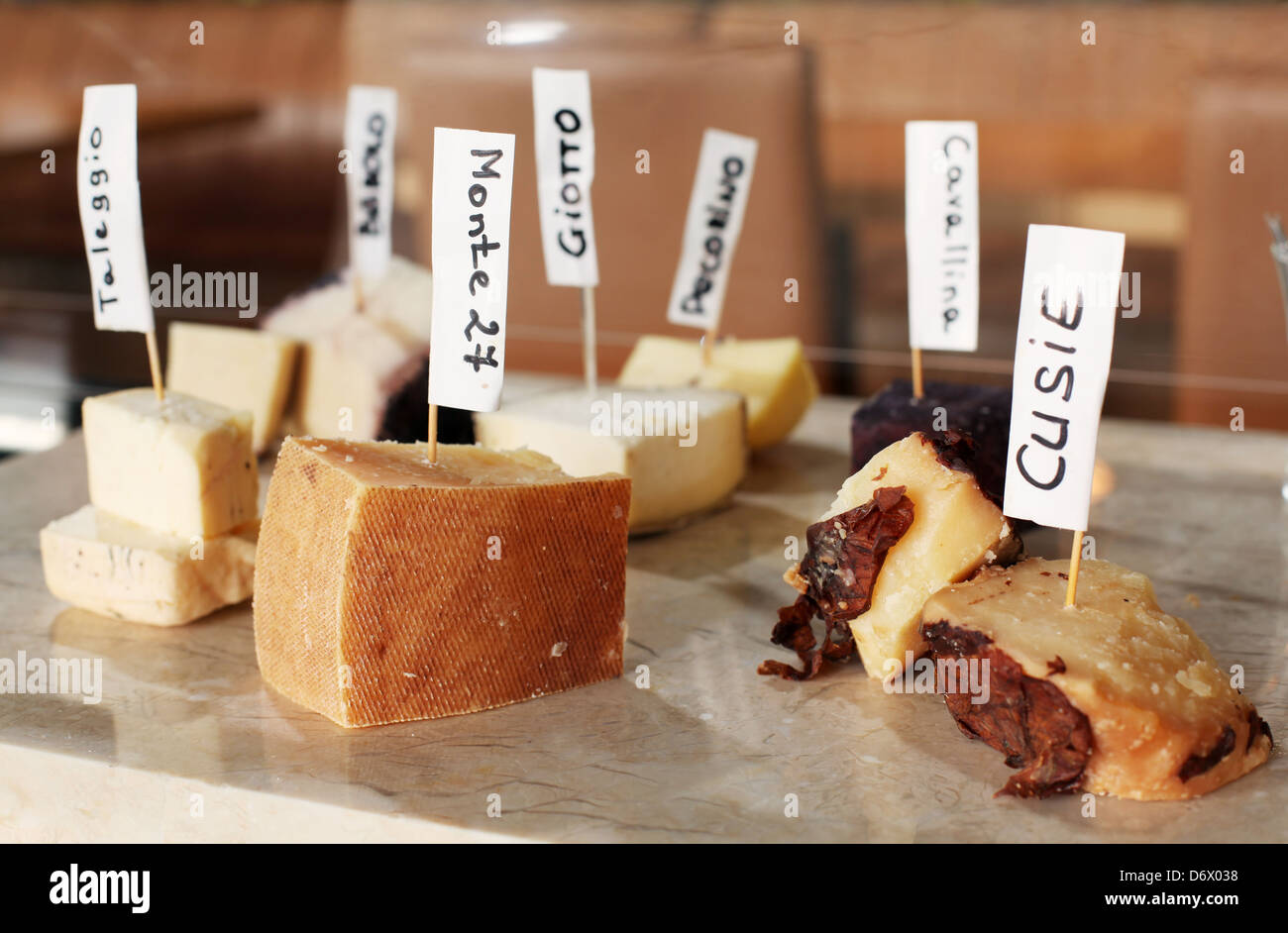 Assortment of cheeses with names. Stock Photo