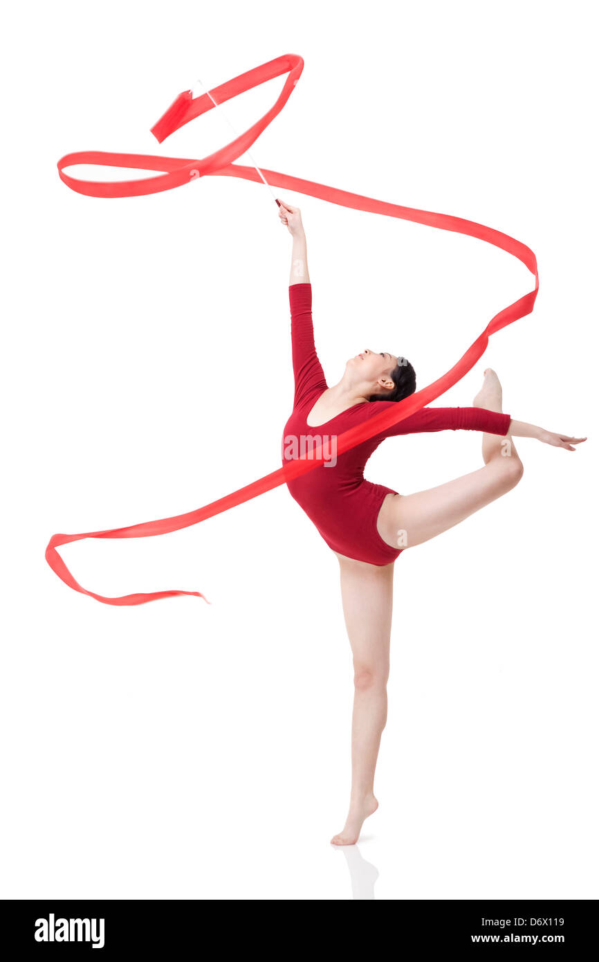 Female gymnast performing rhythmic gymnastics with ribbon Stock Photo -  Alamy