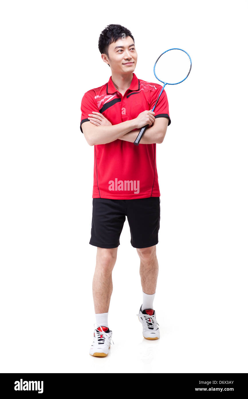 Portrait of male athlete with badminton racket Stock Photo - Alamy