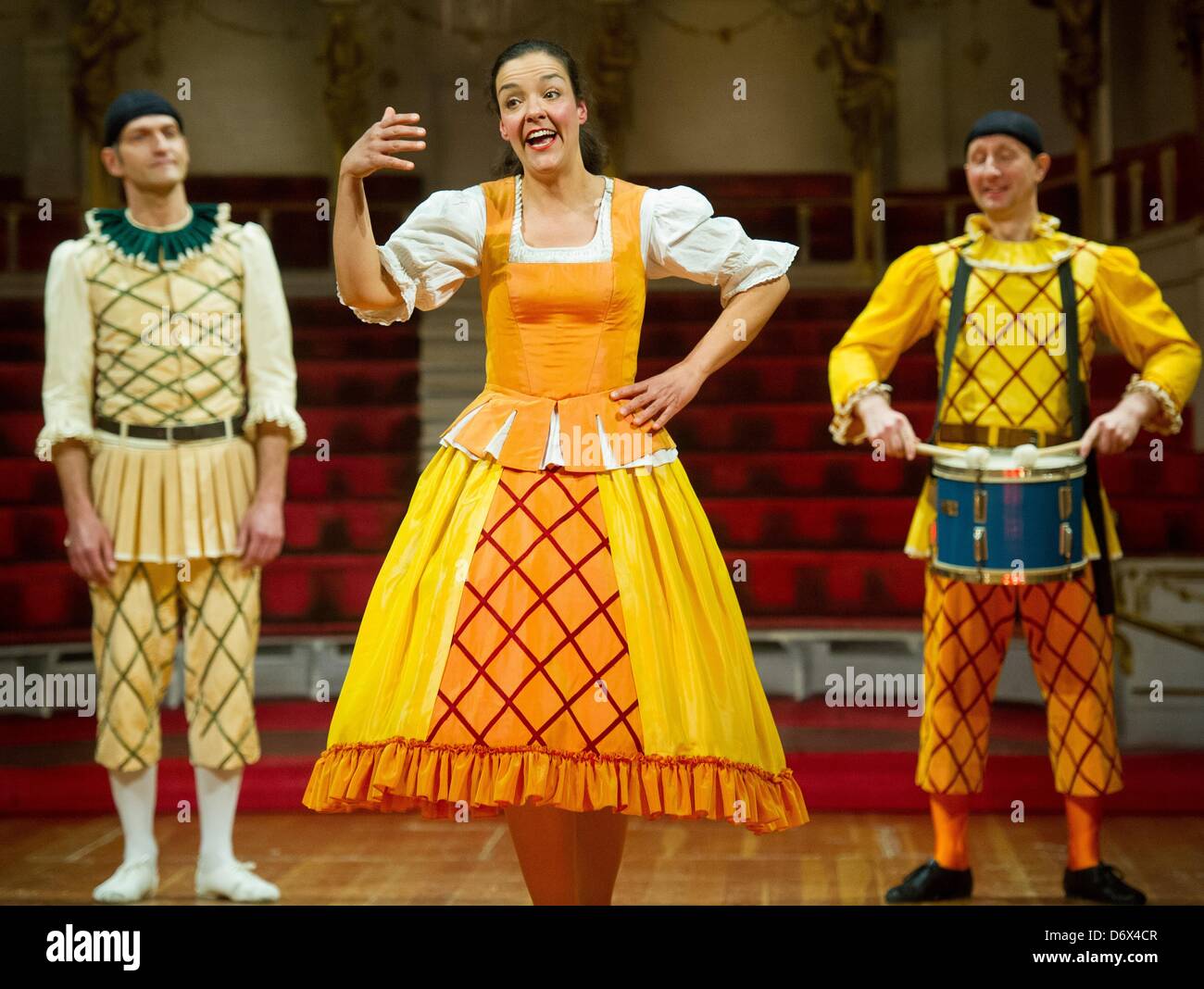 Actors of the Potsdam Ensemble I Confidenti show an excerpt of the play 'Hunger and Love' during a press performance at the Palace Theatre at Neuen Palais at Park Sanssouci in Potsdam, Germany, 24 April 2013.  The Baroque Theatre Summer Sanssouci 2013 is this year dedicated to the Commedia dell'Arte: 'Hunger and Love' (I casi della fame dell'amore) is the musical farce, in which the famous masks and characters of the Comedie Italienne are encountered. Photo: Patrick Pleul Stock Photo