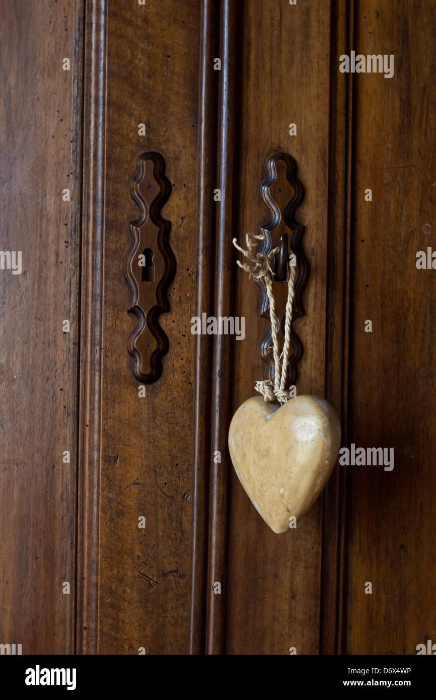 Wooden Heart Suspended To A Wardrobe Stock Photo 55893650 Alamy