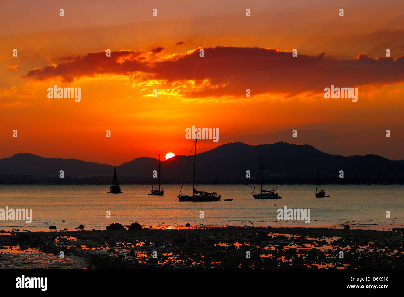 Sunset in Phuket, Thailand a very popular tourist destination for Europeans and Australians Stock Photo