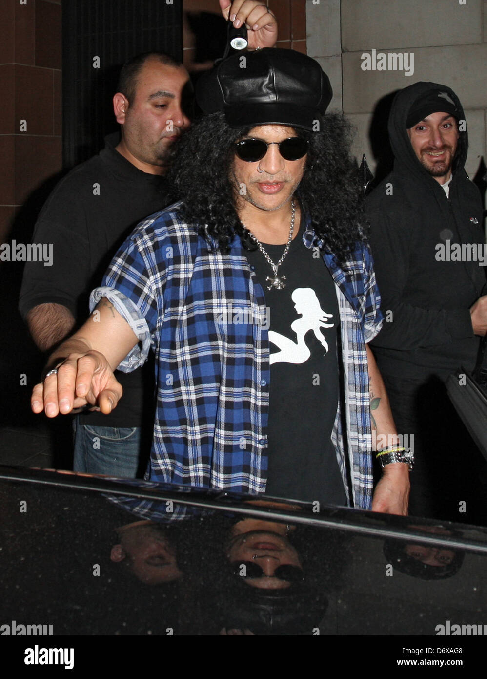 Slash (real name Saul Hudson) and Trinny Woodall seen leaving C