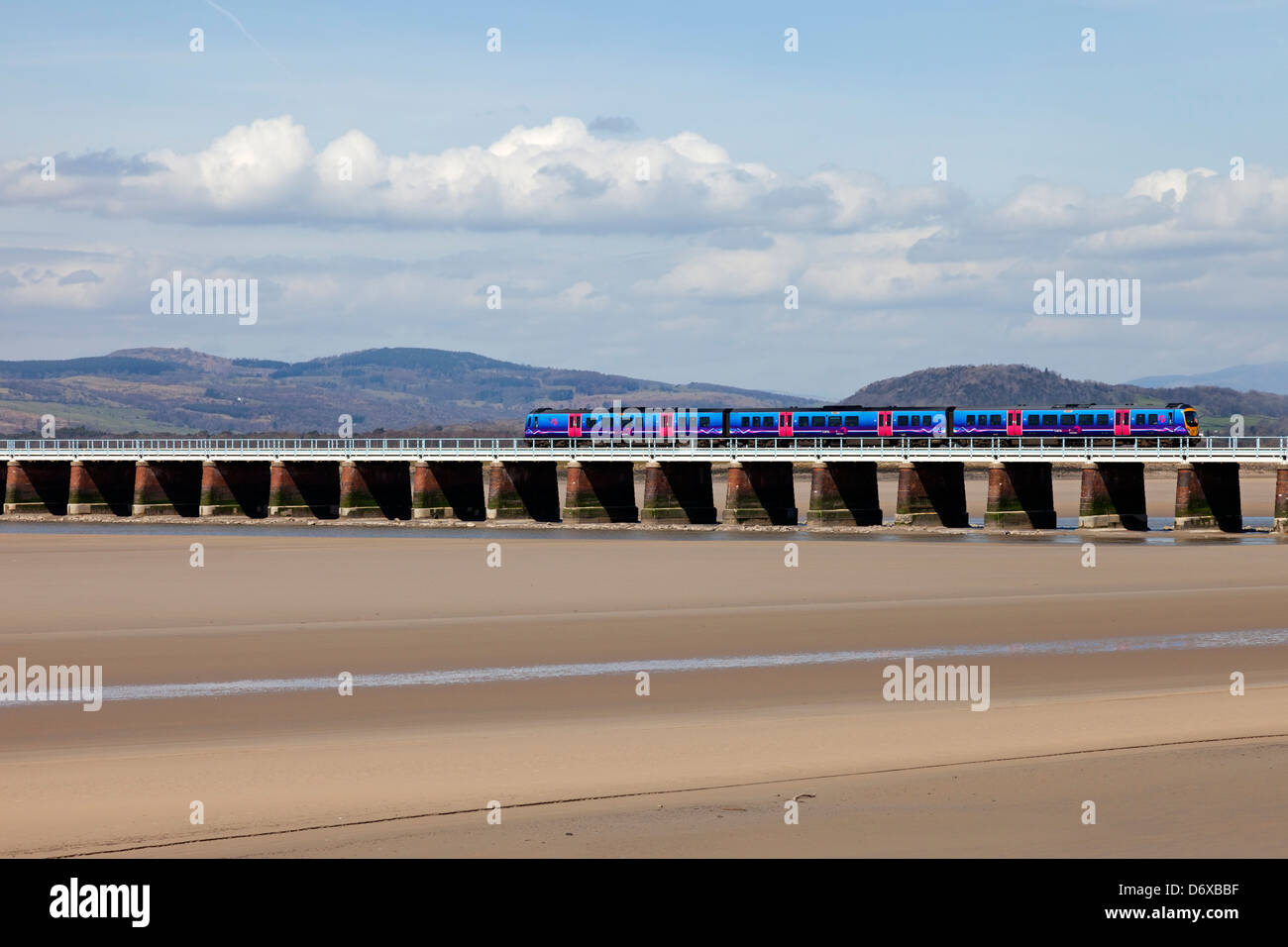 Trans Pennine Express Train Crossing the Kent Viaduct, Kent Estuary Arnside Cumbria UK Stock Photo