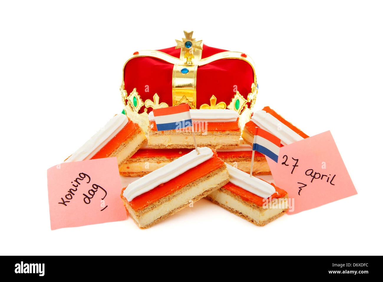 Typical Dutch tompouce sweet with crown over white background Stock Photo