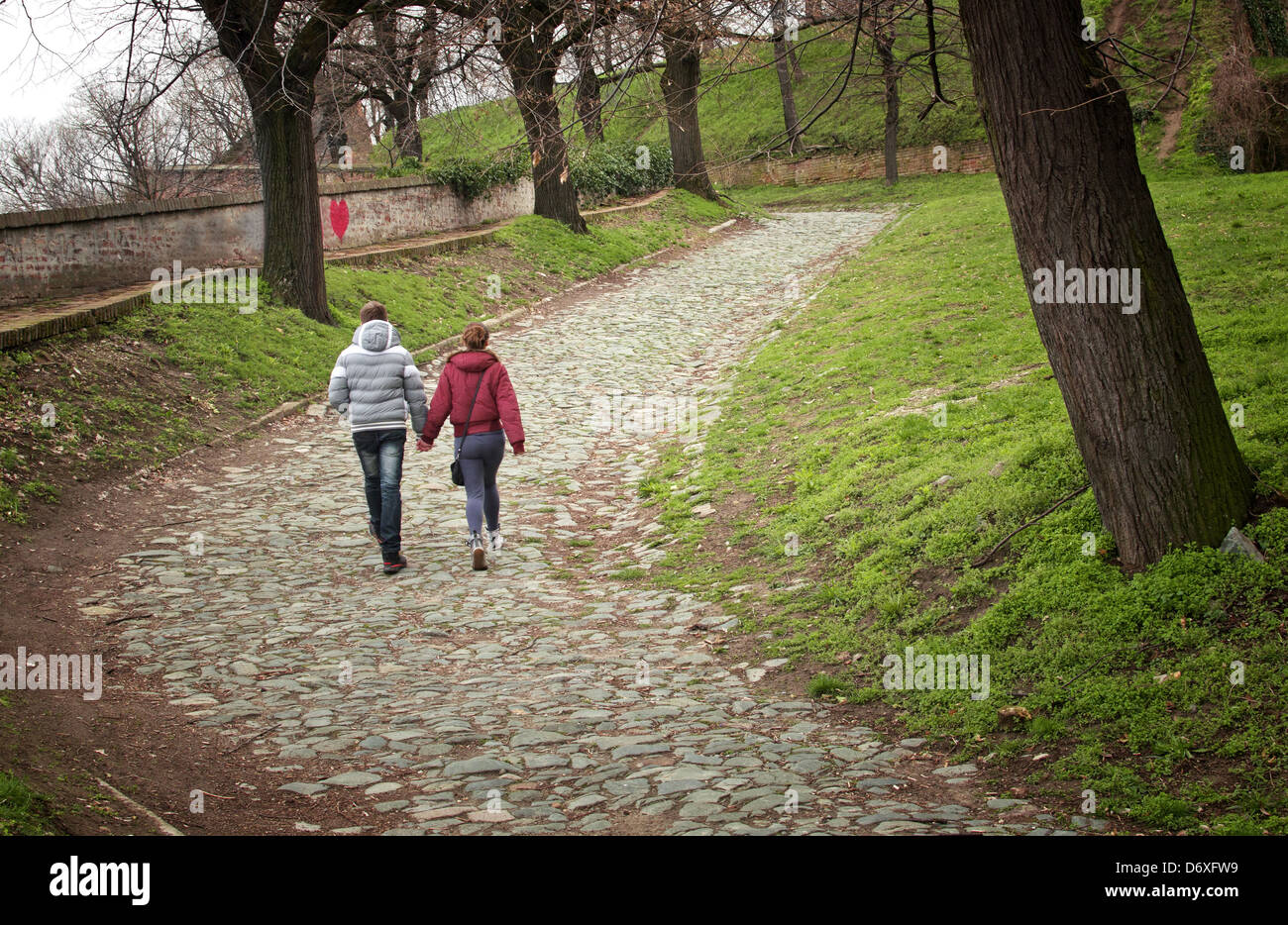 Beautiful woman walking in park hi-res stock photography and images - Alamy