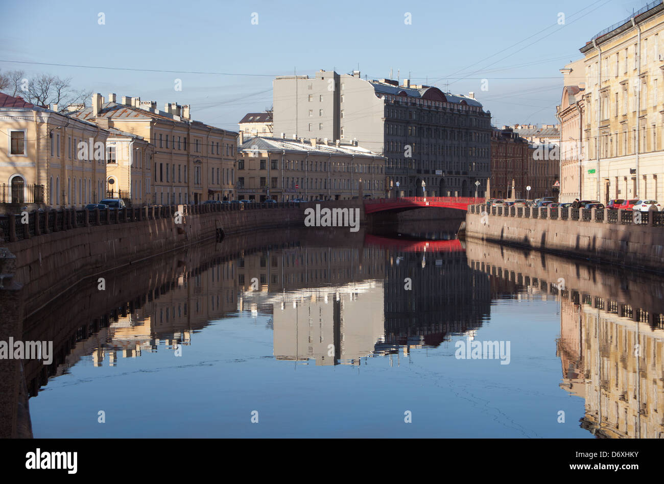 The Red Bridge across the Moika River in Saint Petersburg, Russia. Stock Photo