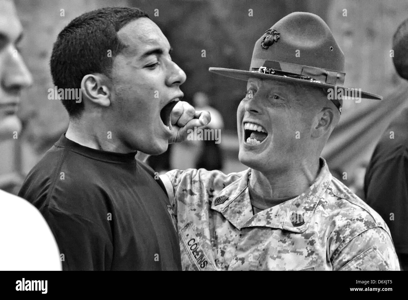 US Marine Corps drill instructors screams at a Marine recruit during a mini boot camp April 9, 2011 in Annapolis, MD. Stock Photo