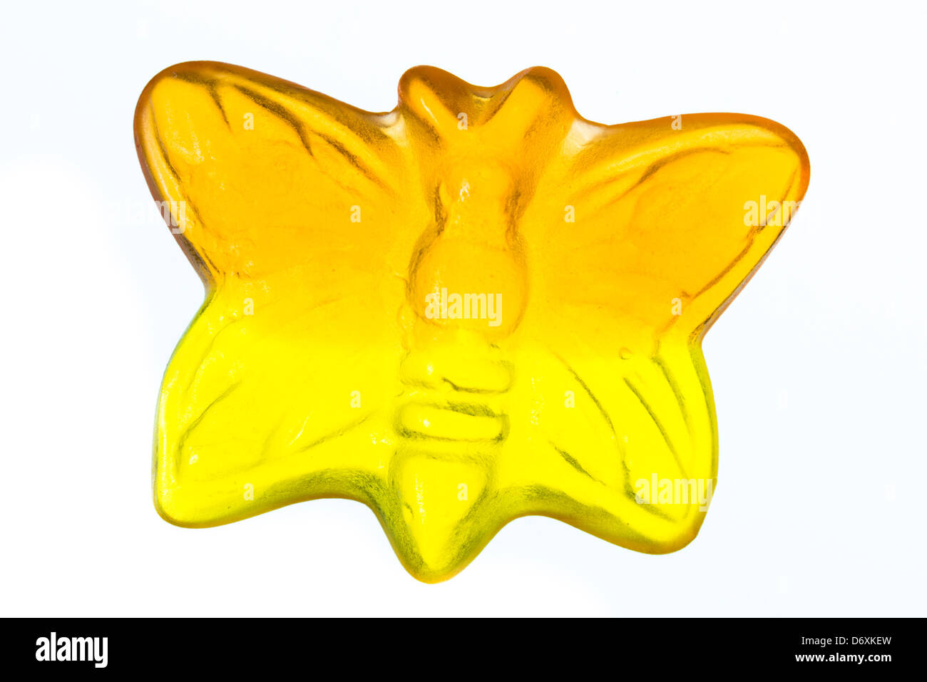 Fruit Gum, shaped like a butterfly on white background Stock Photo