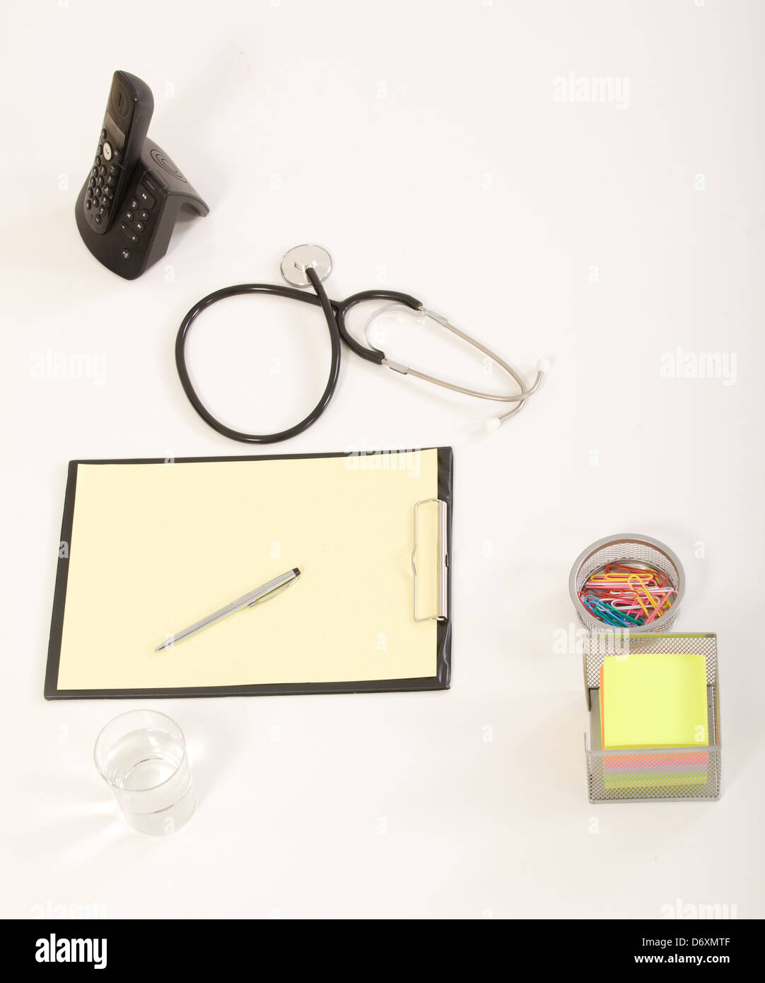 Digital tablet with stethoscope and paperwork Stock Photo - Alamy