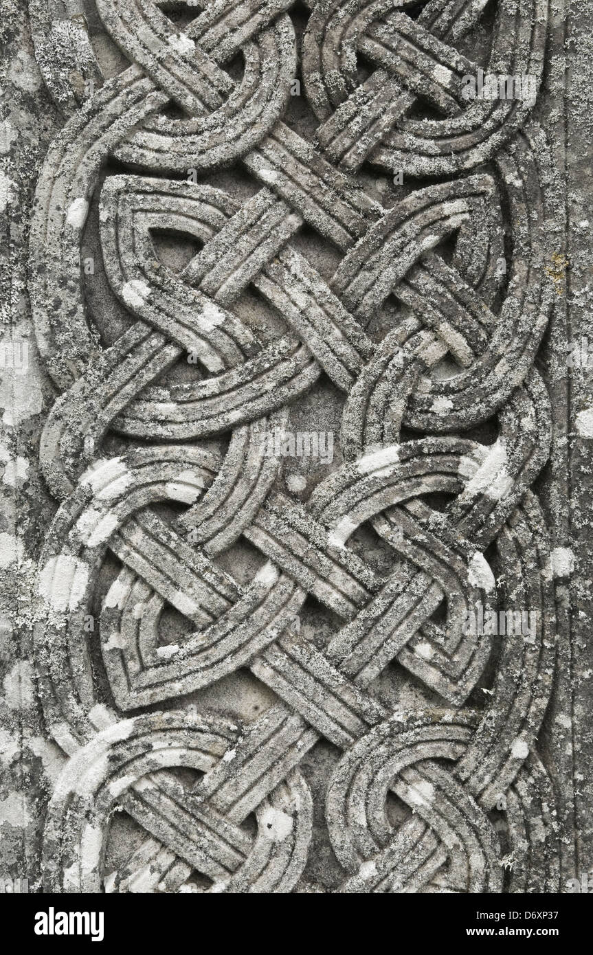 Celtic knotwork carved in stone. Stock Photo