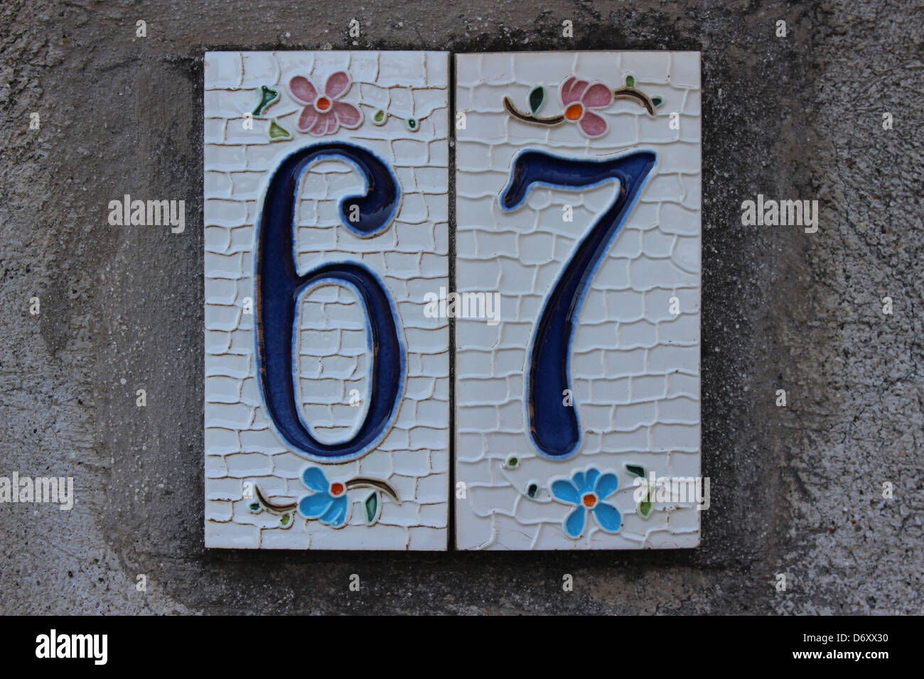 67 Tile numbered (door number) Stock Photo