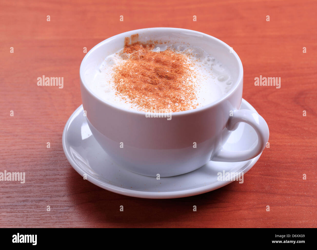 Cup of hot milk with nutmeg or cinnamon Stock Photo Alamy