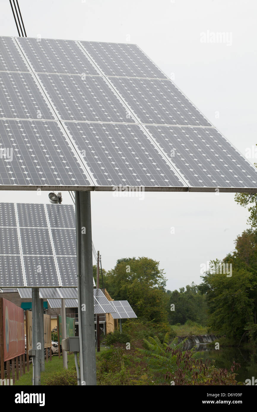 Solar panels are used to generate electricity for a business company in