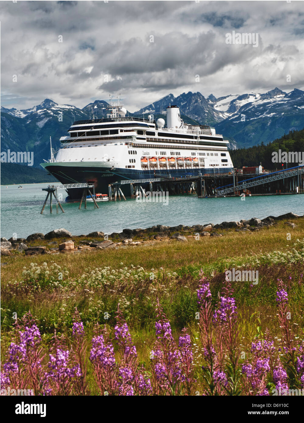 The cruise ship dock with a Holland America ship docked in Haines Alaska Stock Photo
