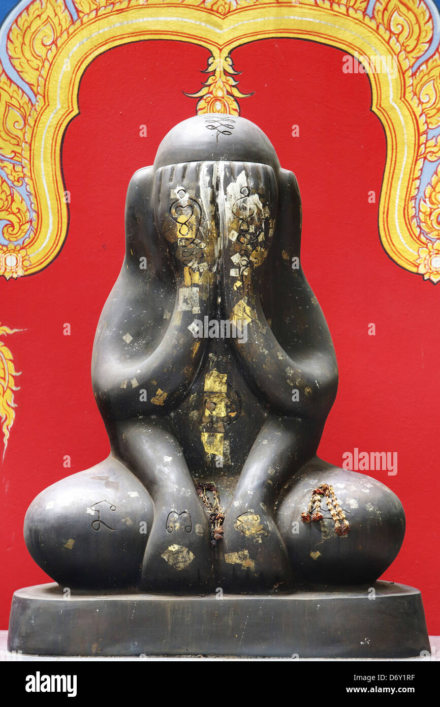 Thai giant amulet called Phra pidta mean closed eyes buddha Stock Photo