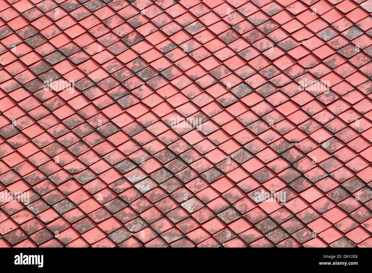 Red old Tiles roof in The Temple of Thailand. Stock Photo