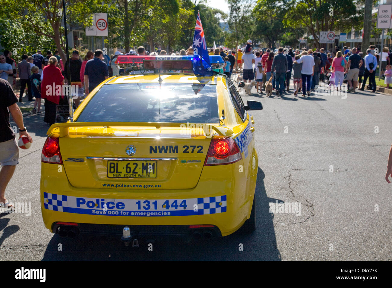 Sydney Australia, Australian police car a  yellow Holden Commodore SS in ANZAC Day parade in Avalon Beach,Sydney,NSW,Australia Stock Photo