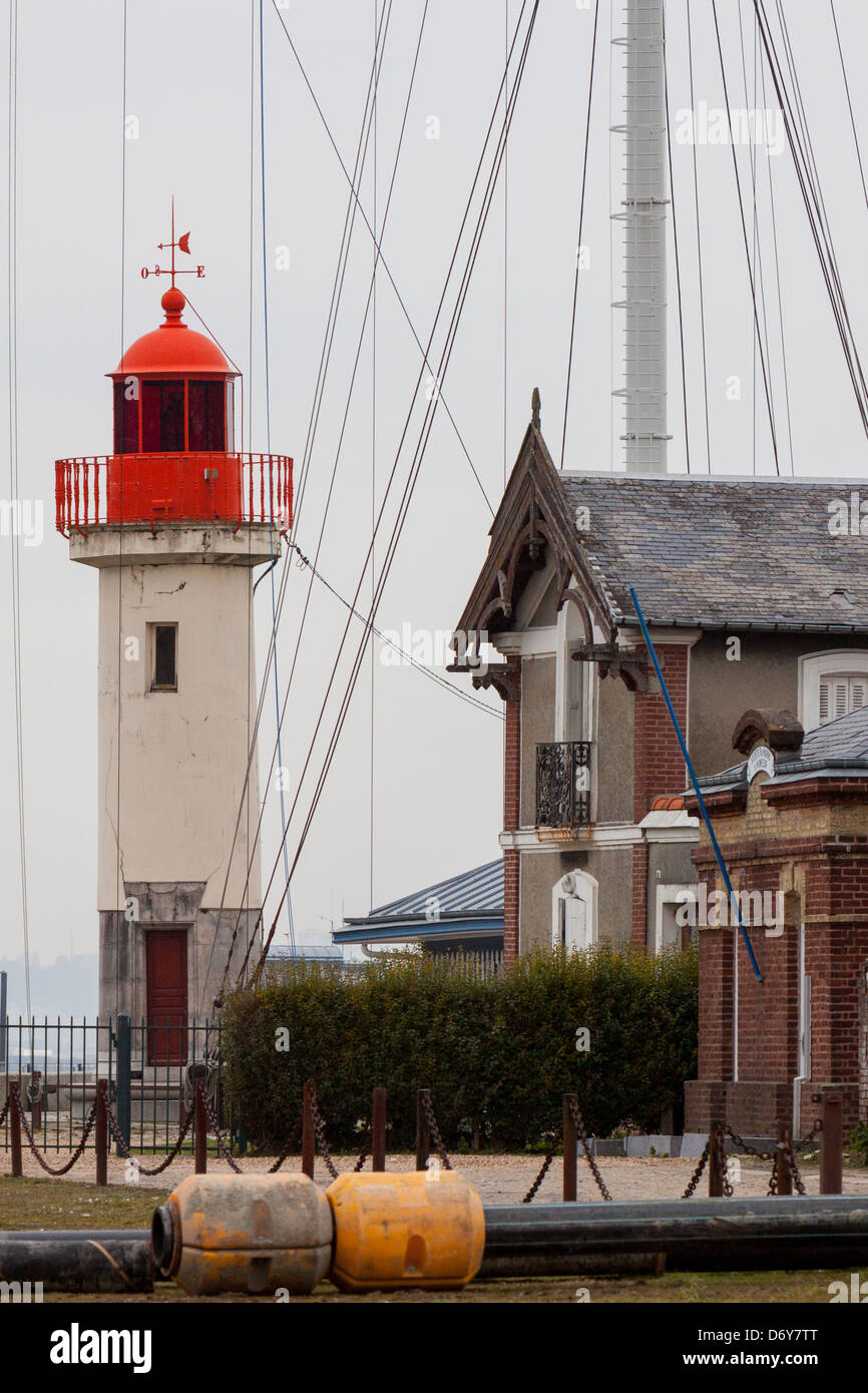 red lighthouse in entrance at honfleur harbour, Normandy, France Stock Photo