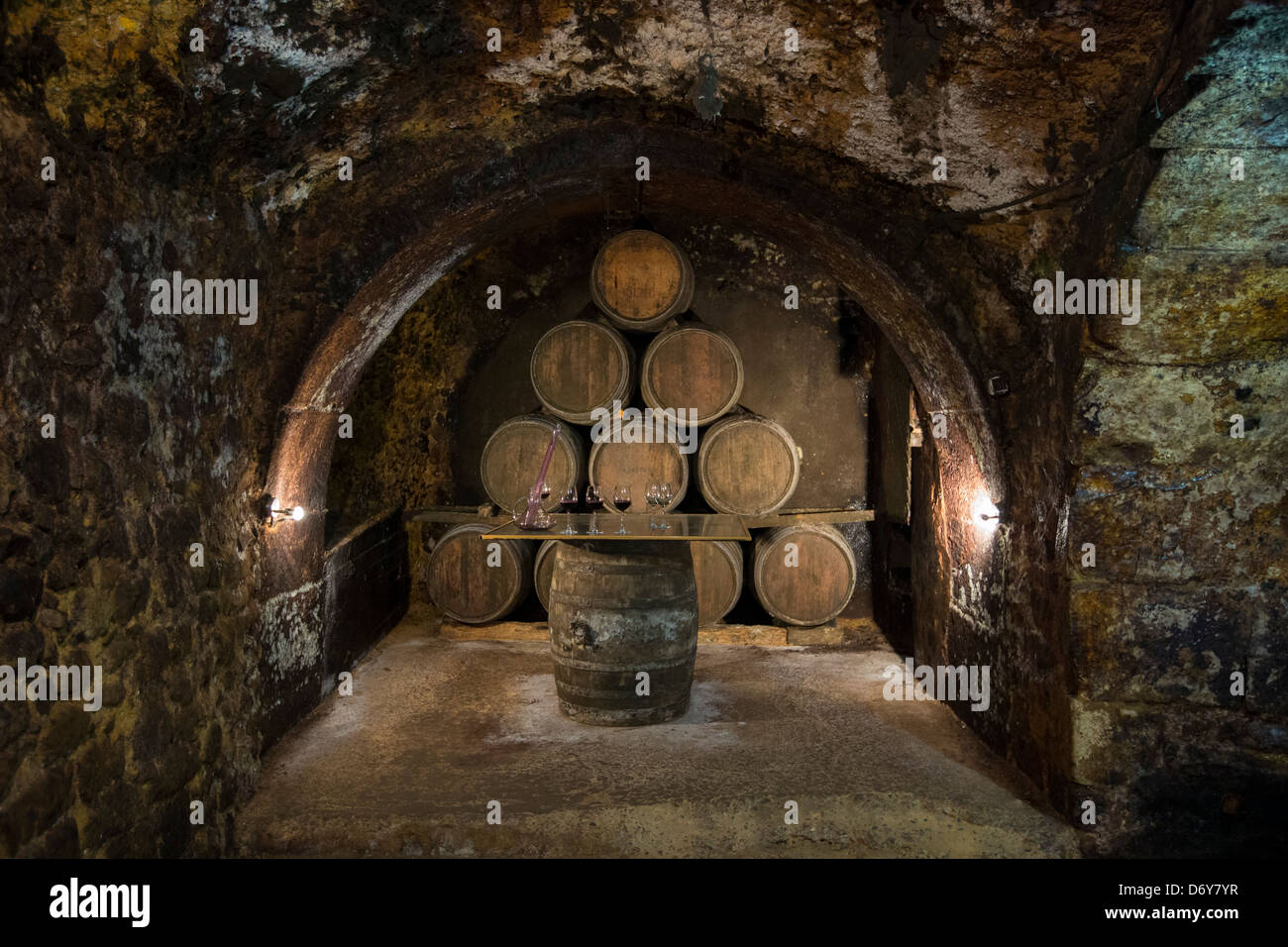Oak barrels of Rioja wine at Carlos San Pedro Bodega winery in medieval town of Laguardia in Basque country, Spain Stock Photo