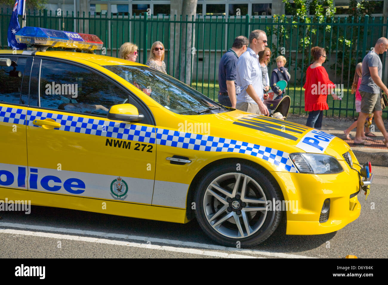 Bright yellow Australian police vehicle, a yellow holden commodore ss vehicle,Avalon Beach,Sydney,NSW,Australia Stock Photo