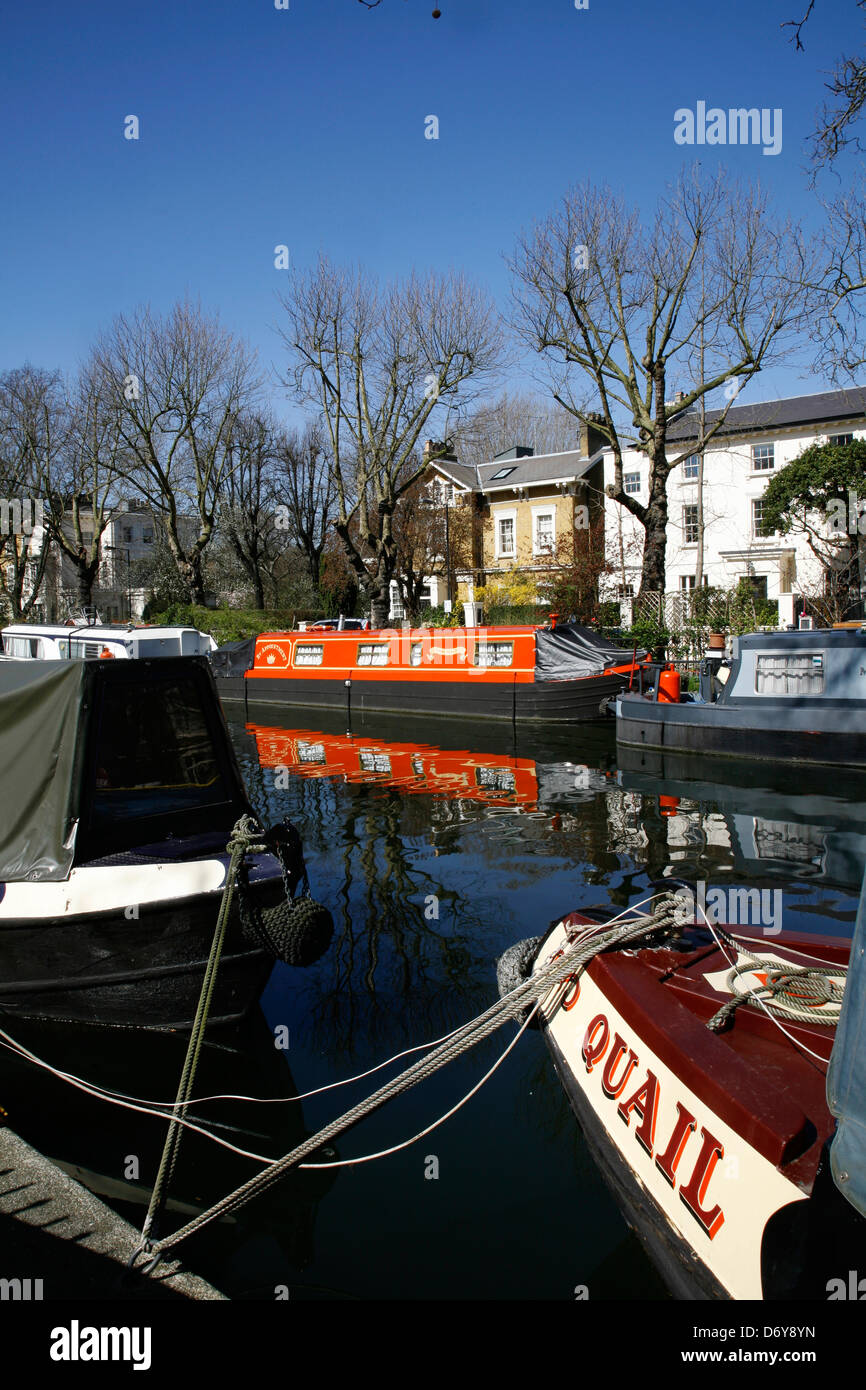 Canal boats moored on the Regent's Canal beside Blomfield Road, Maida Vale, London, UK Stock Photo