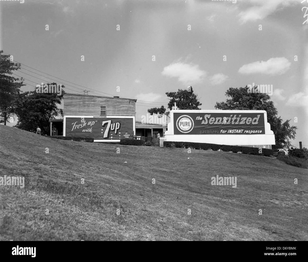 Billboard advertisements for 7Up and Pure gasoline Stock Photo