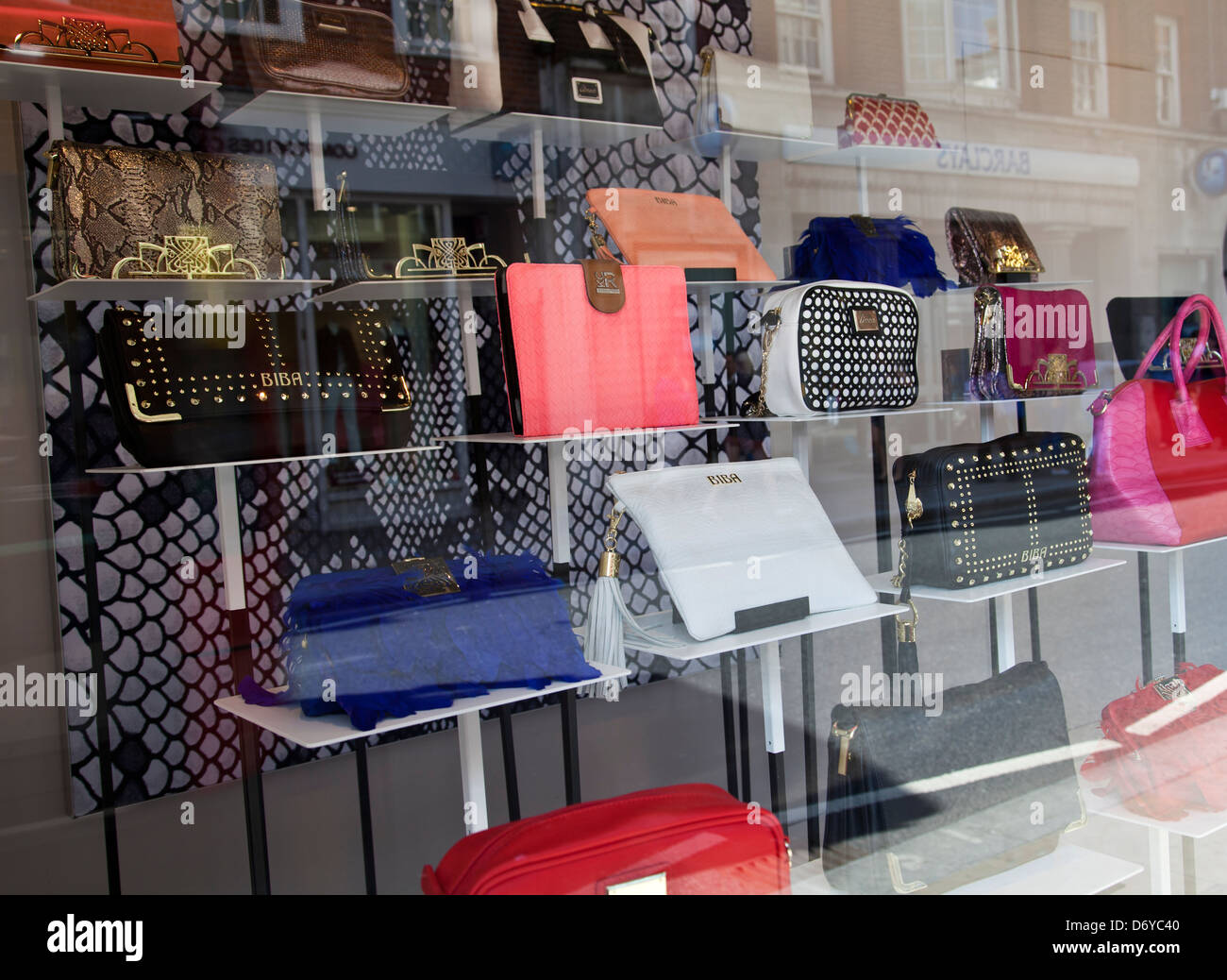 Handbags on Display in House of Fraser department Store Window in Richmond , London UK Stock Photo