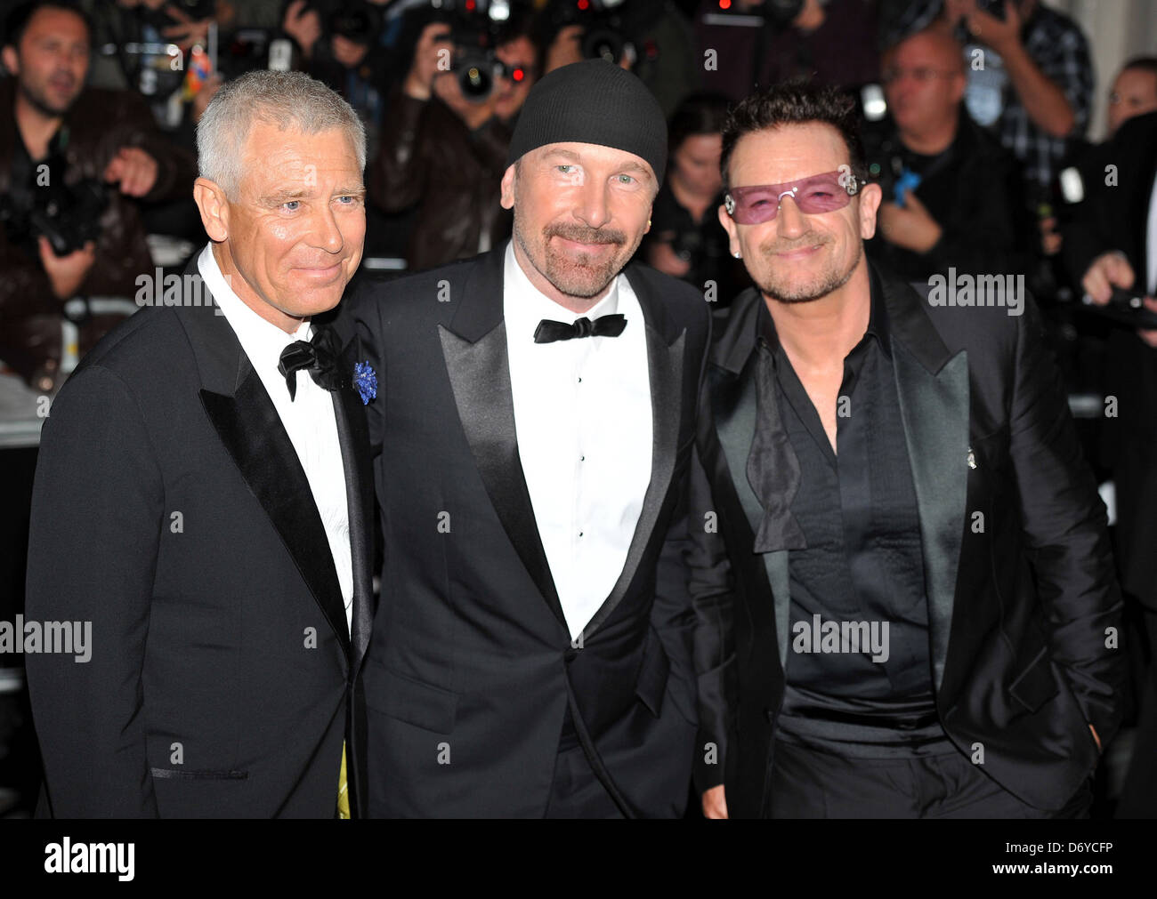 Adam Clayton, The Edge and Bono of U2 2011 GQ Men of the Year 