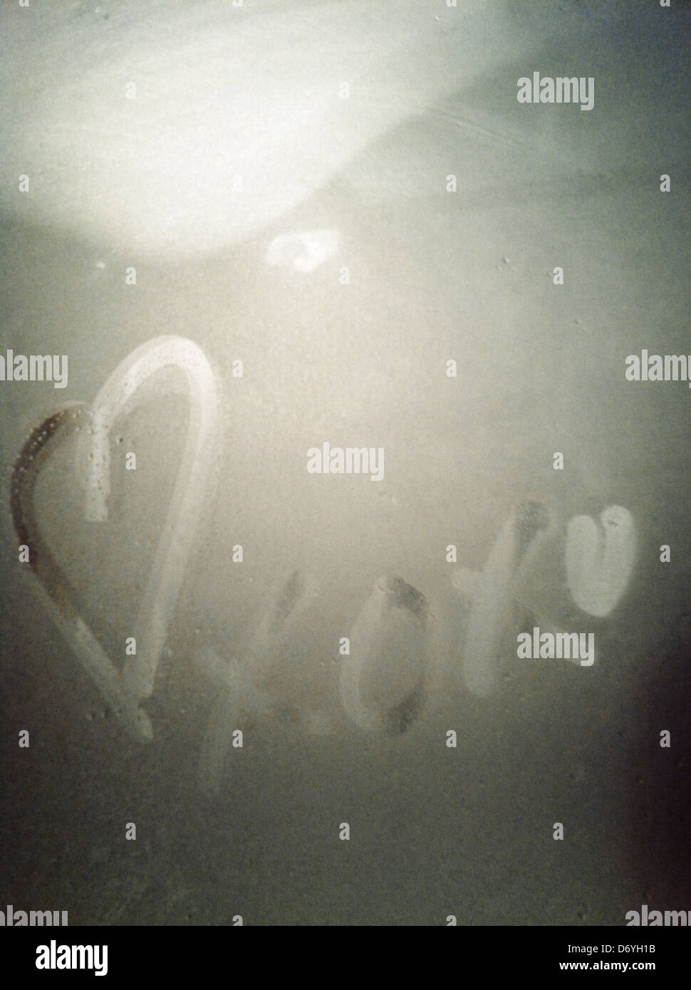 Heart and x's and o's on mirror - Smartphone Captured Stock Image