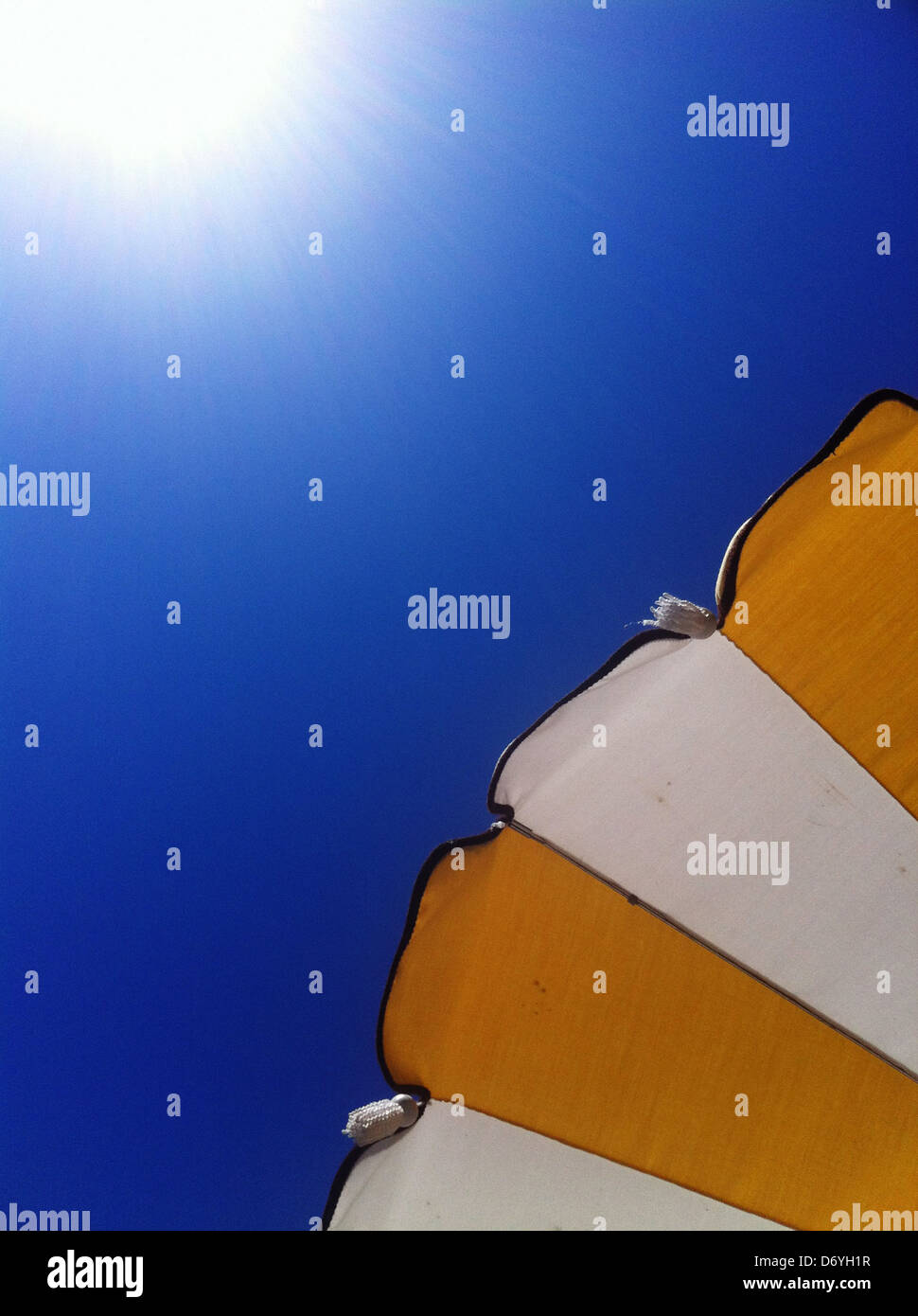 Sun, sky and beach umbrella - Smartphone Captured Stock Image