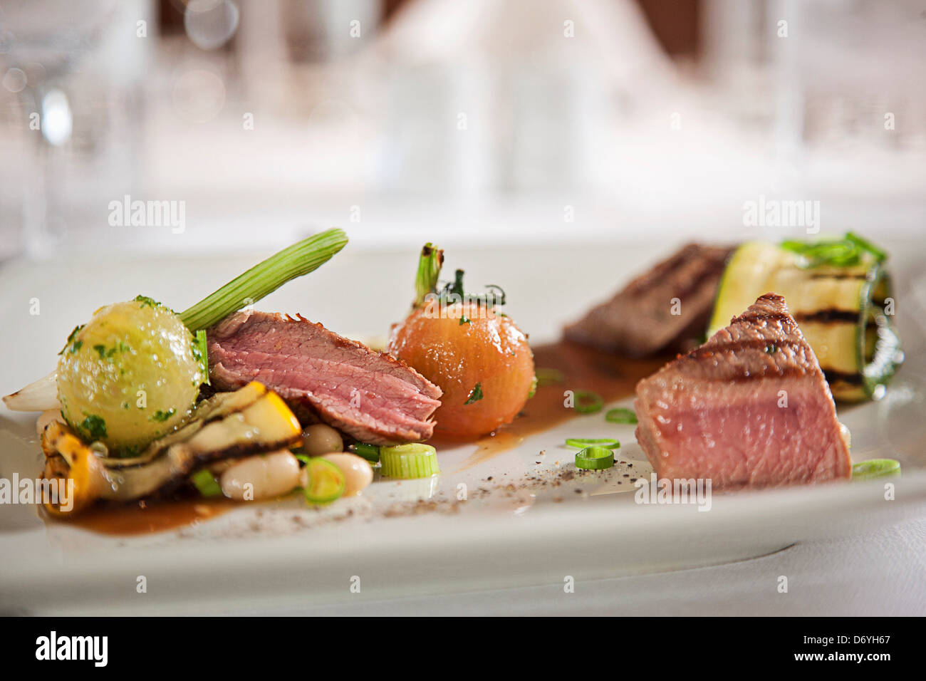 Gourmet grilled steak and vegetables served on a plate Stock Photo - Alamy