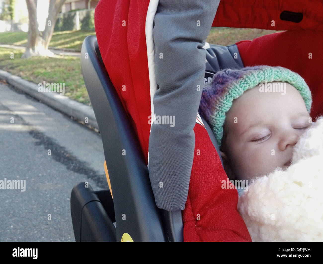 Caucasian baby sleeping in stroller Stock Photo Alamy