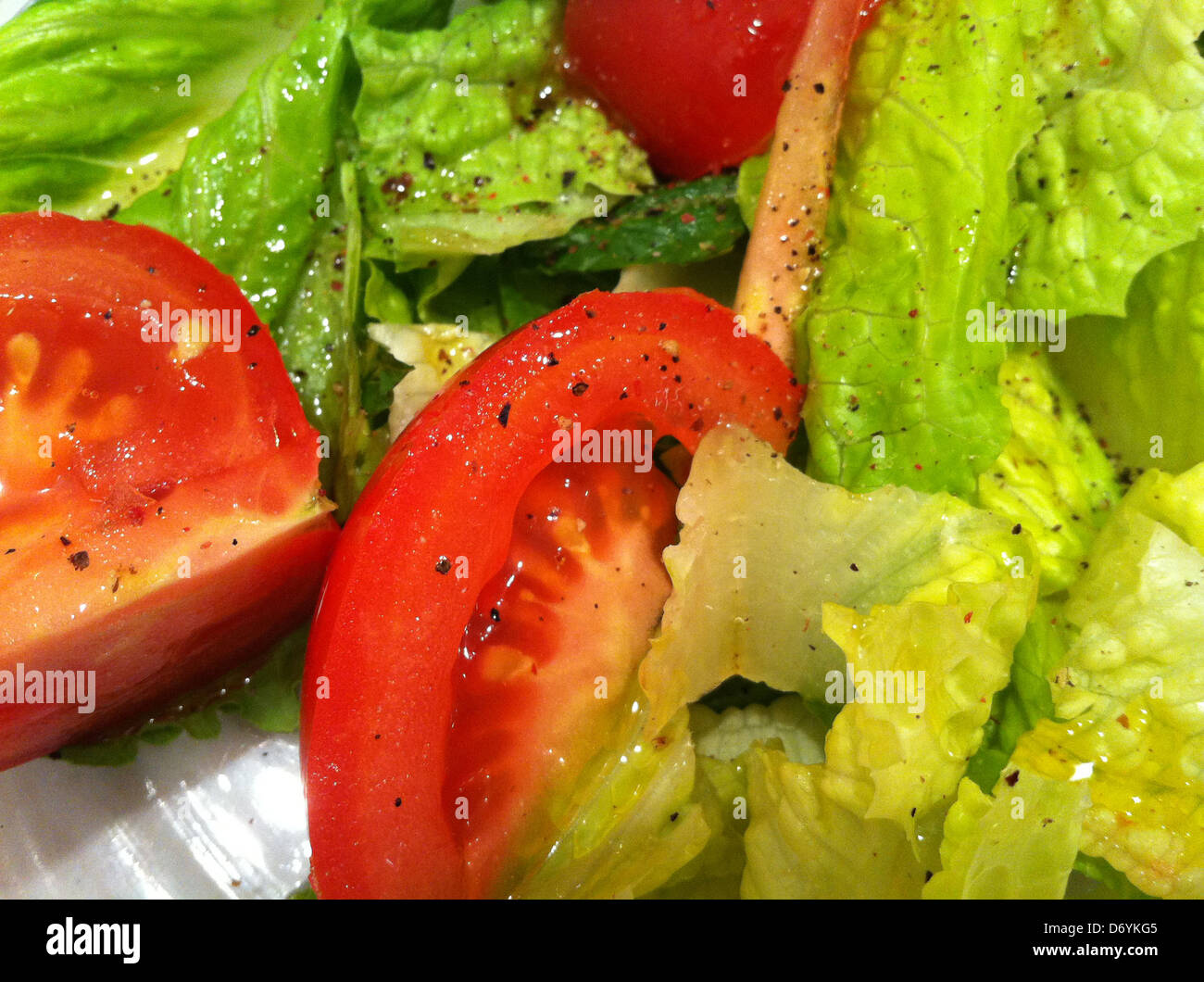 Close up of tomatoes in salad - Smartphone Captured Stock Image