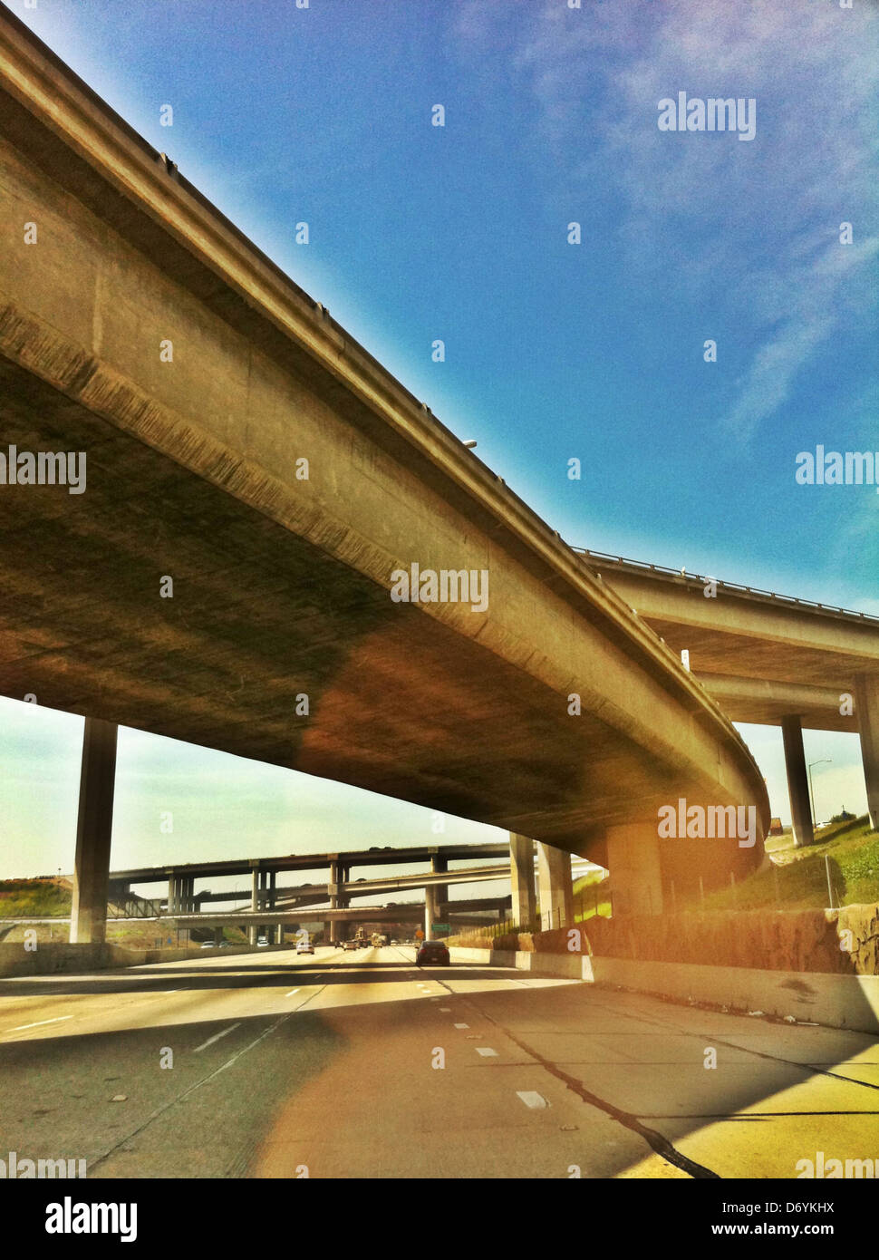 Freeway overpass against blue sky, Los Angeles, California, United States - Smartphone Captured Stock Image