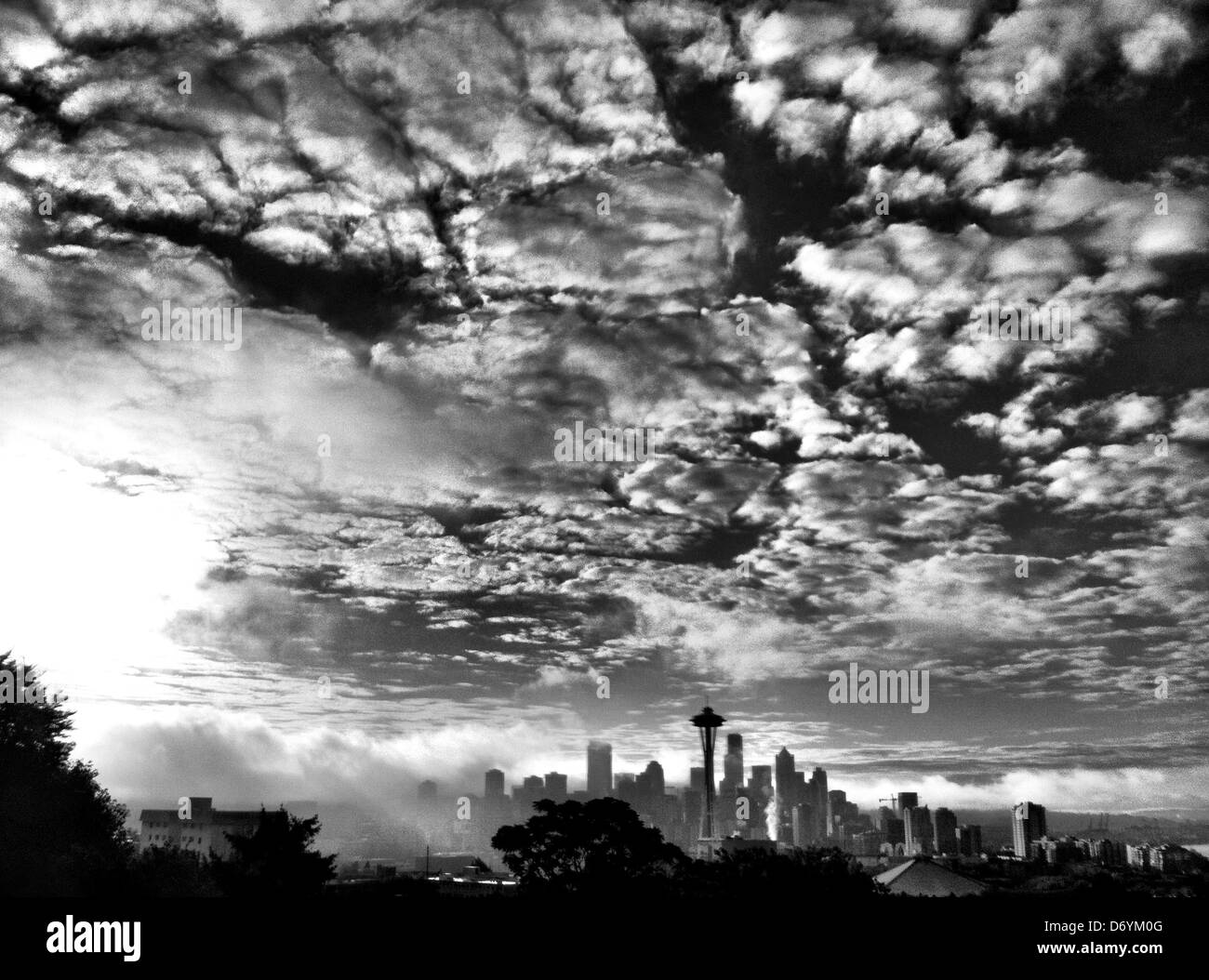 City skyline under dramatic sky, Seattle, Washington, United States